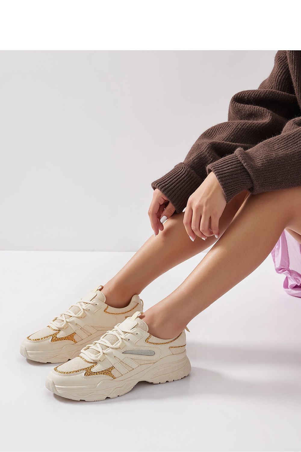 Vega Beige sport sneakers by Inello featuring elegant golden glitter details, designed for stylish comfort and available in sizes 4-8.