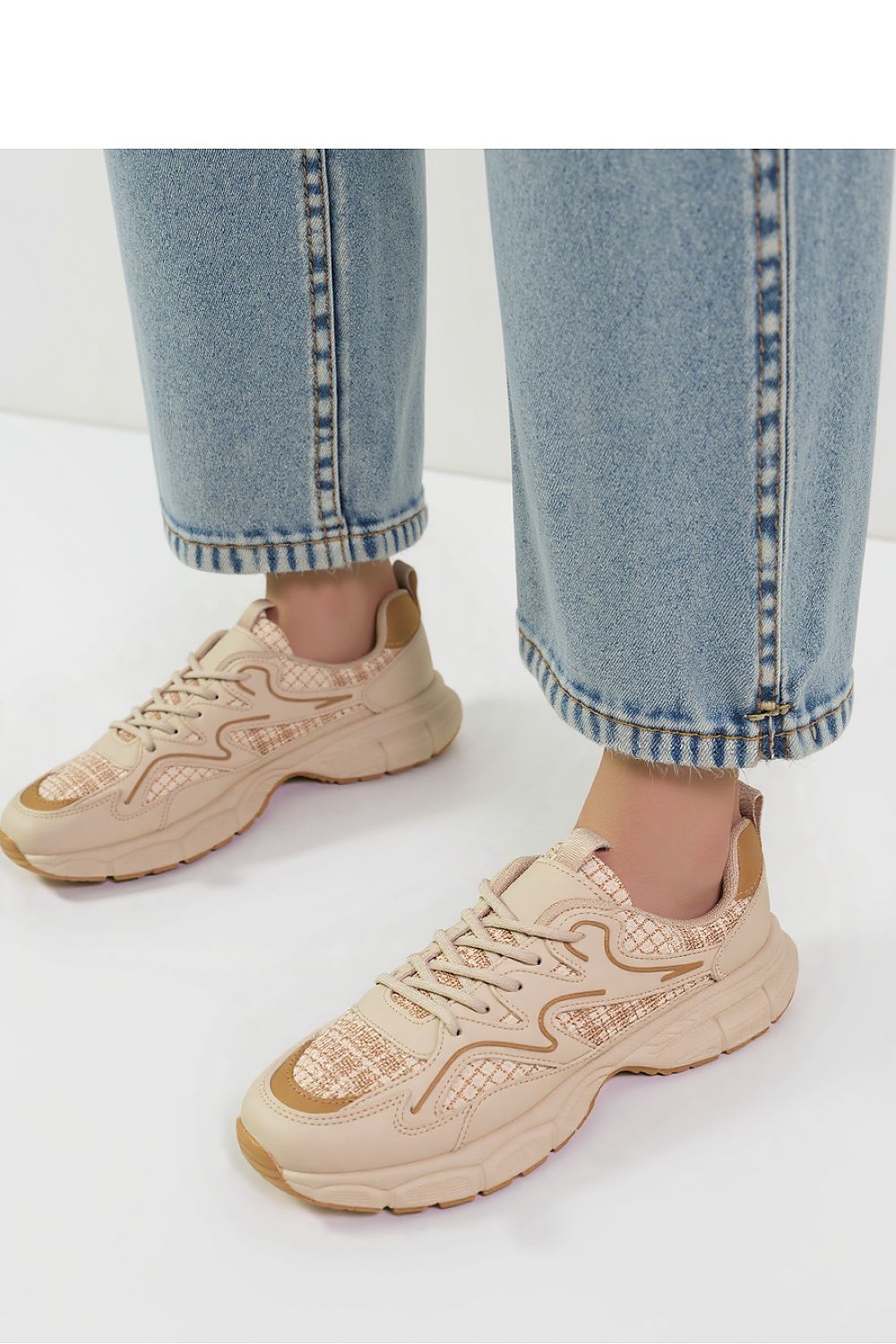 Stylish Inello beige sport sneakers for women, showcasing lightweight design and comfort, perfect for urban fashion.