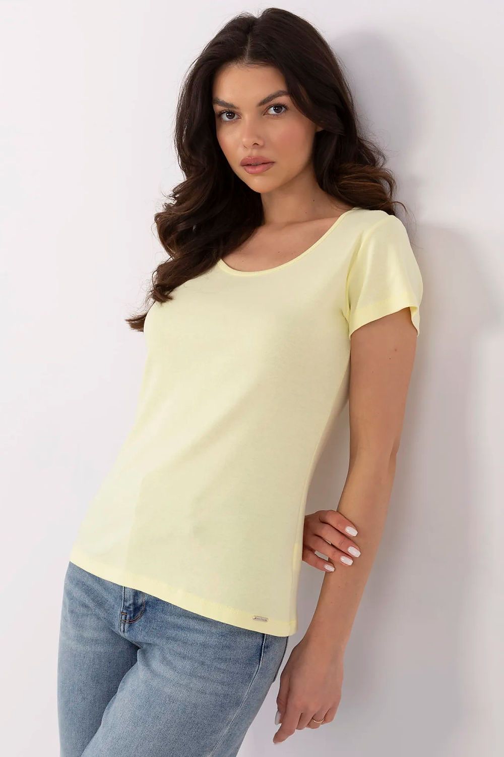 Luxury women's casual t-shirt in soft yellow, designed by Relevance, showcasing a smooth round neckline and short sleeves, ideal for effortless styling.