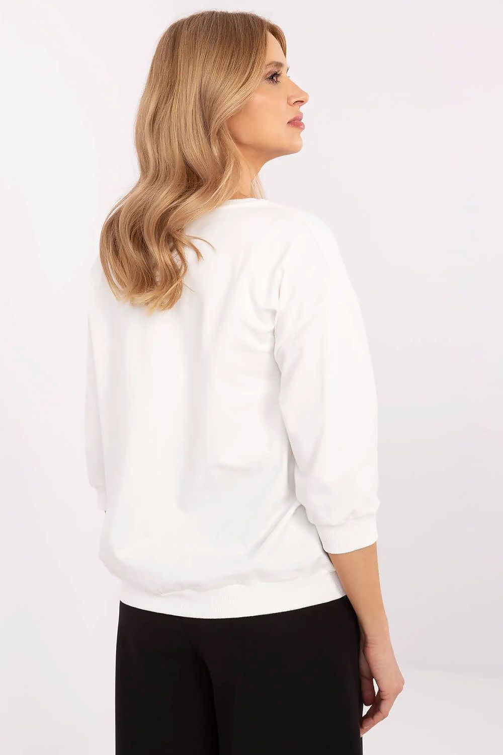 Graceful back view of a white casual women's blouse, blending comfort and style, from the luxury brand Relevance.