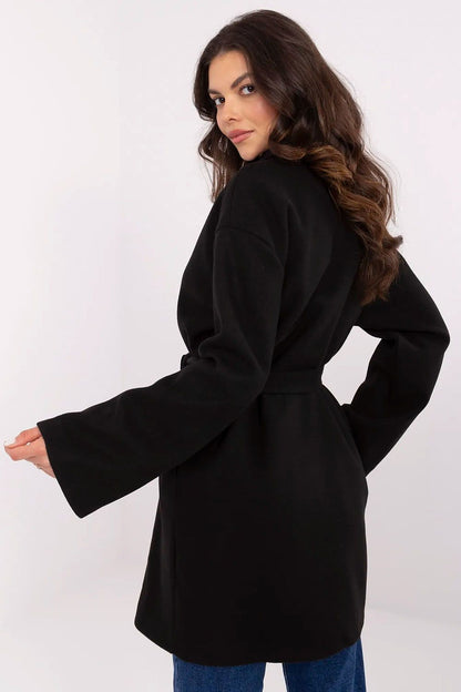 Rear view of a stylish black Och Bella women's coat, featuring wide sleeves and a cinched waist, ideal for adding a touch of luxury to any outfit.