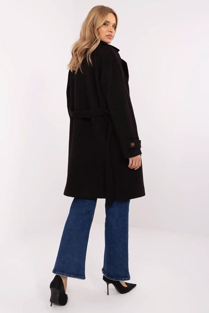 Back view of an elegant women's knee-length coat in black by Och Bella, showcasing a tailored fit with a waist tie.
