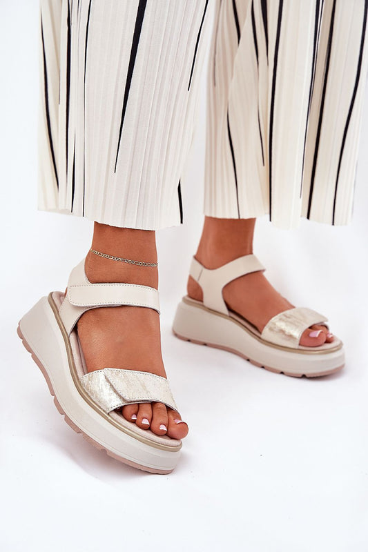 Elegant women's leather sandals with platform wedge heel by Step in Style, featuring a stylish design suitable for summer, showcasing beautiful foot detailing.