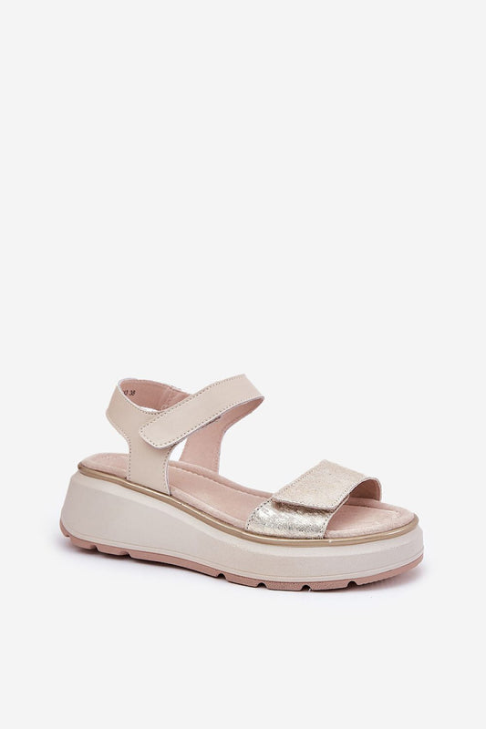Close-up view of elegant women's leather sandals with a platform wedge heel by Step in Style, highlighting the luxurious materials and sophisticated finish.
