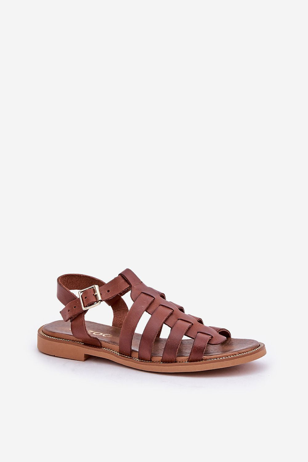 Exquisite brown natural leather sandals from Step in Style, featuring a modern woven design with adjustable buckle, elegantly displayed from a side angle.