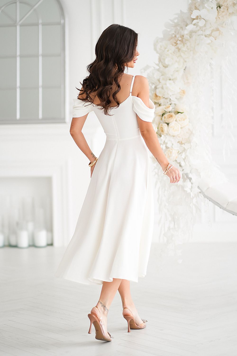 Elegant ecru midi dress featuring a draped top and dropped sleeves showcased against a luxurious backdrop, perfect for formal events by Bicotone.