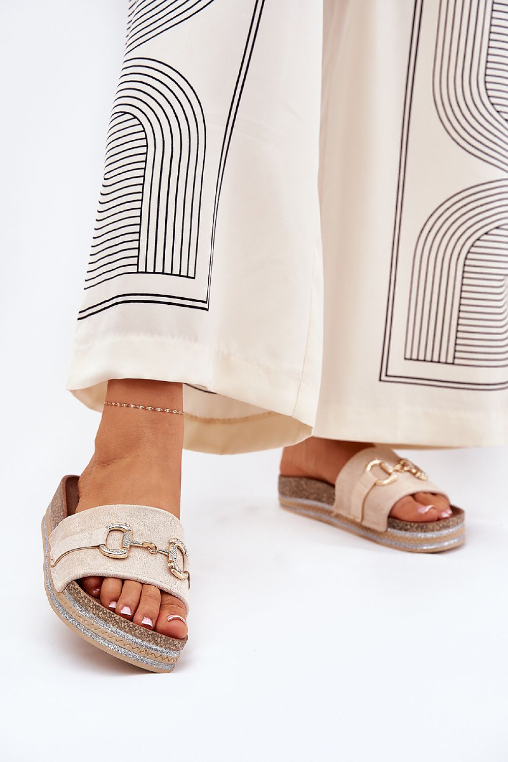 Luxury eco suede flip-flops with decorative gold detail, designed by Step in Style. The slippers feature a stylish platform with sequins and are perfect for summer outfits.