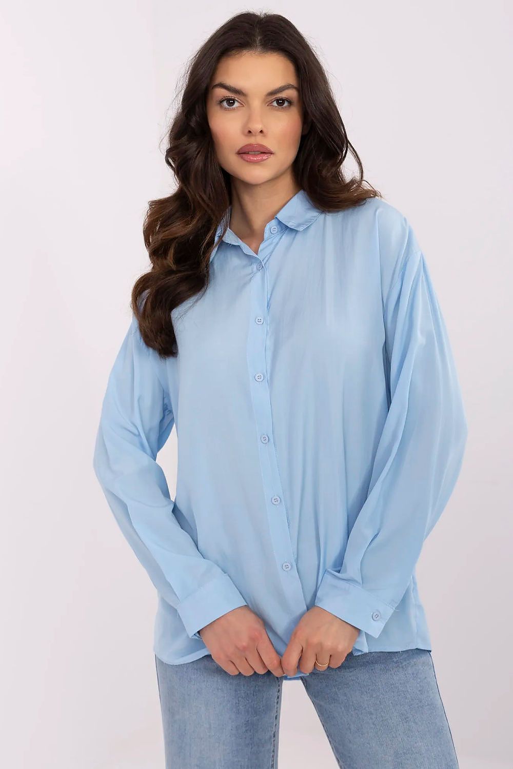 Front view of the elegant long sleeve women's shirt in blue by NM, demonstrating a refined casual look.