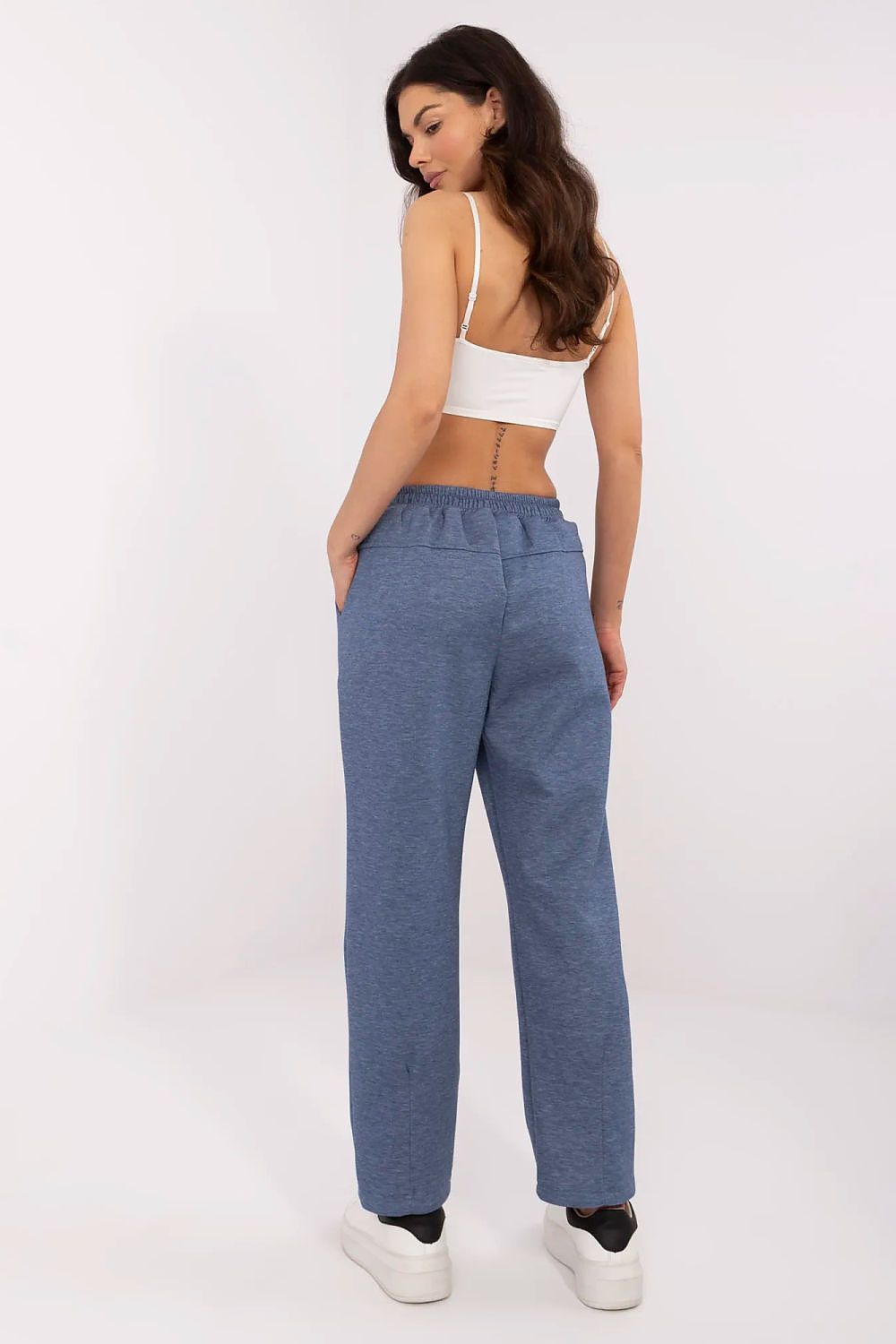 Back view of Italy Moda high waist tracksuit trousers, featuring an adjustable waistband and tailoring that enhances feminine curves, ideal for both casual and formal occasions.