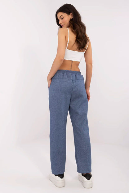 Back view of Italy Moda high waist tracksuit trousers, featuring an adjustable waistband and tailoring that enhances feminine curves, ideal for both casual and formal occasions.