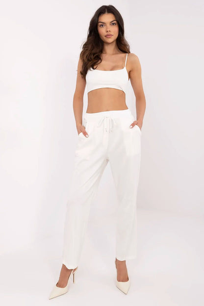 Chic white high waist tracksuit trousers for women by Italy Moda, featuring a trendy front view with a cropped top that highlights a luxurious look for any occasion.