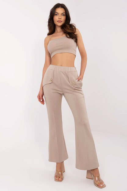 Trendy beige high waist bell-shaped sweatpants by Italy Moda, featuring side pockets and a fashionable design, suitable for both casual and upscale occasions.