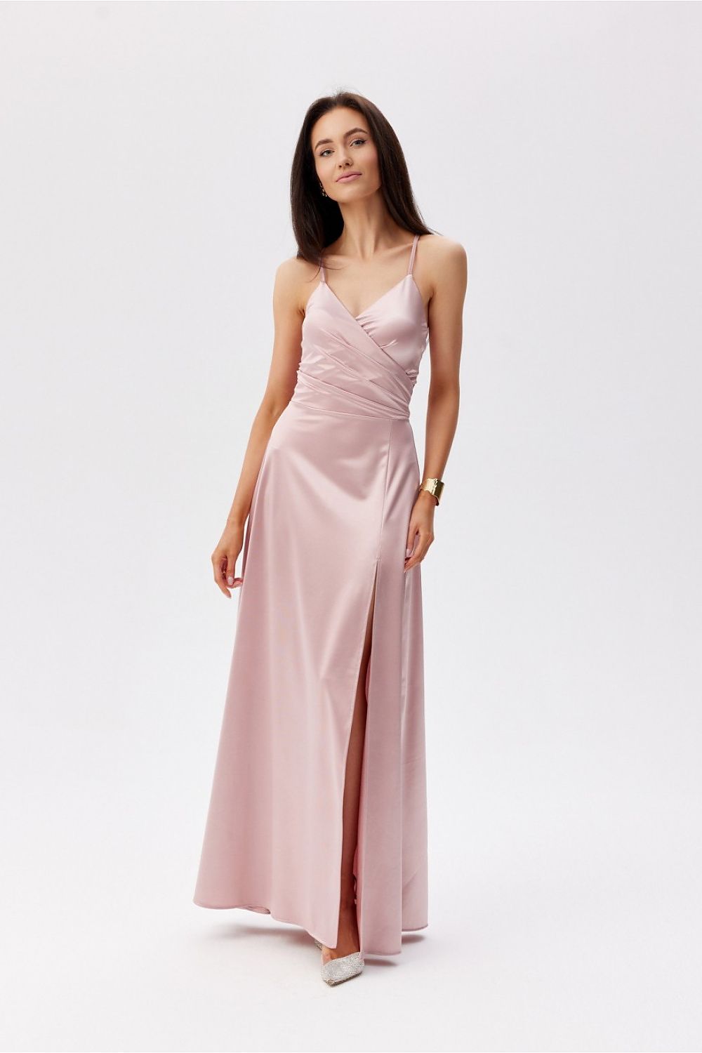 Elegant Roco Fashion Maxi Dress with Slit in soft pink, featuring thin straps and a flattering wrap-around top, perfect for special occasions.