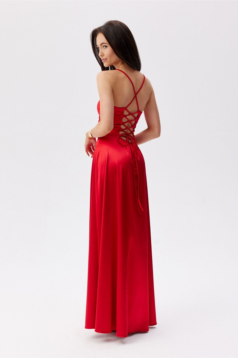 Charming Roco Fashion Maxi Dress in red with a delicate lace-up back and flowing skirt, ideal for a luxurious evening out.