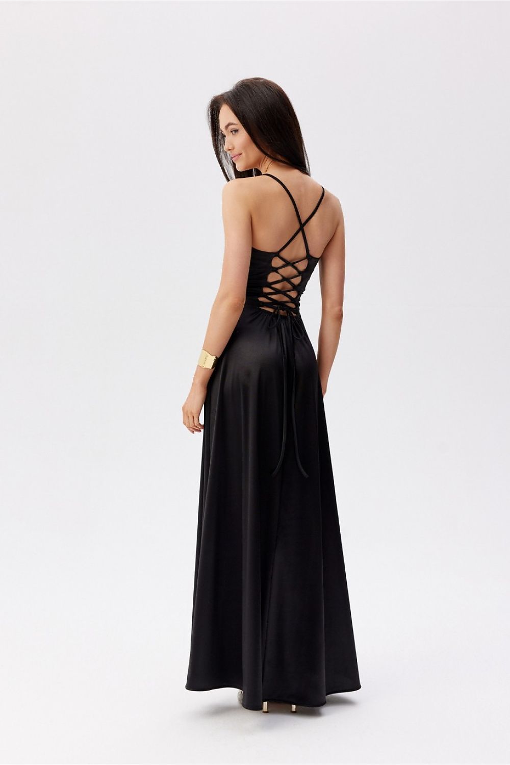 Back view of a black Roco Fashion maxi dress with intricate lace-up detailing and thin straps, combining elegance and sophistication.