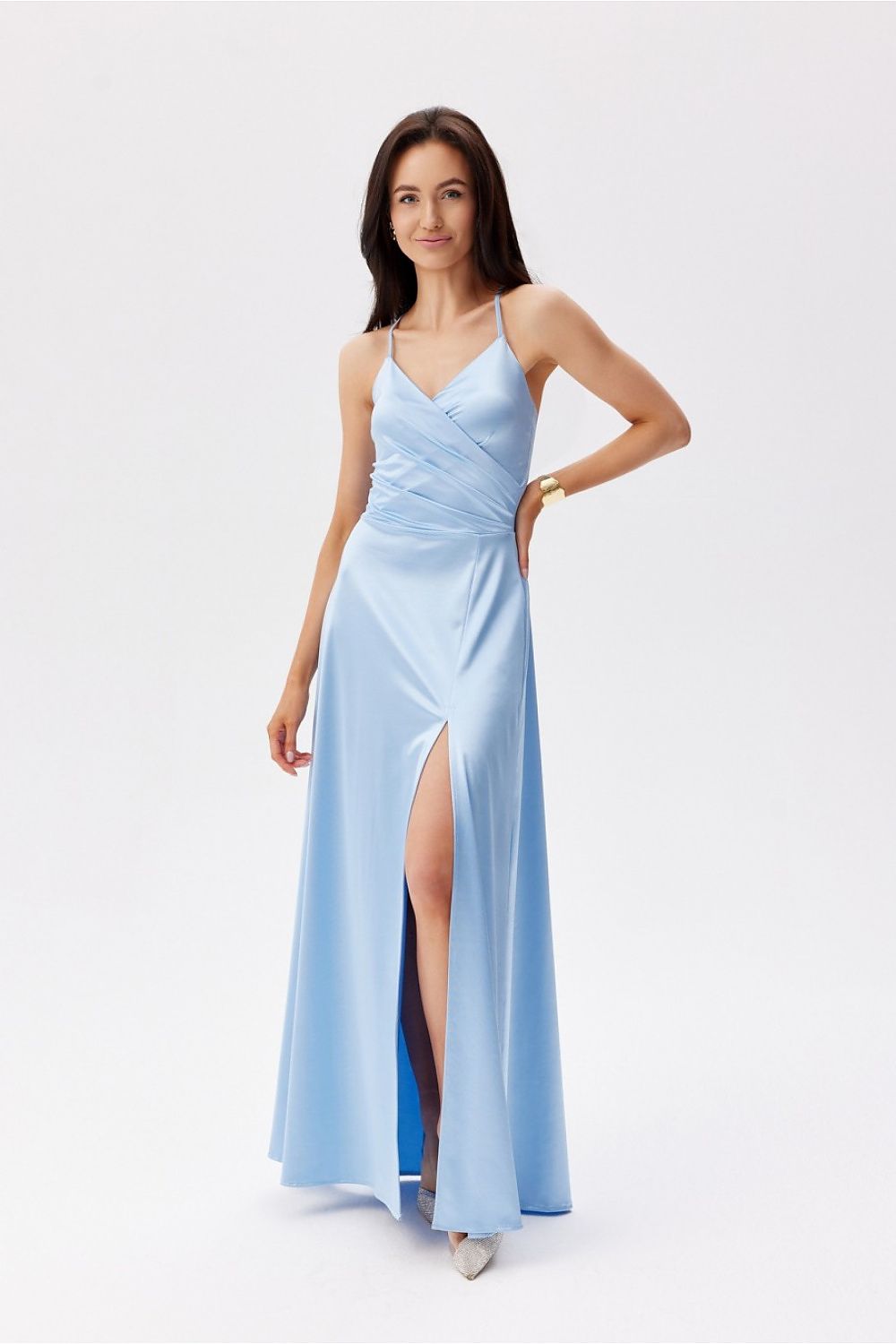 Light blue Roco Fashion maxi dress with a trendy thigh-high slit and delicate thin straps, perfect for summer gatherings.