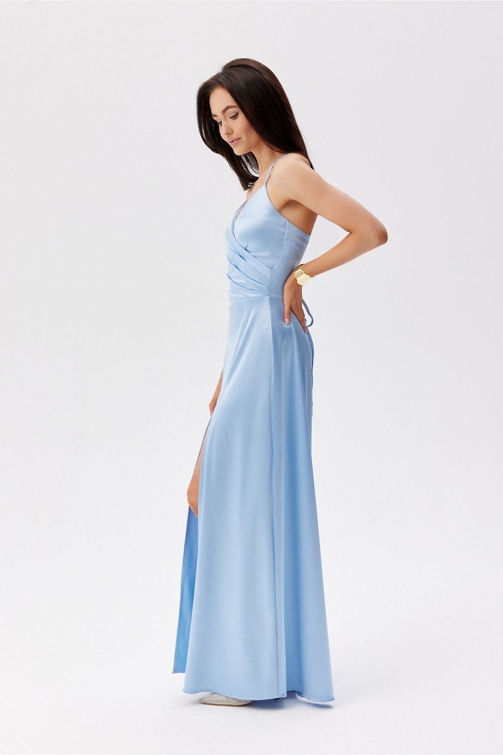 Elegant blue maxi dress by Roco Fashion featuring thin straps and a thigh-high slit, perfectly suited for formal occasions.
