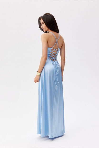 Back view of a luxurious blue maxi dress by Roco Fashion with decorative lacing and thin straps for a tailored fit.