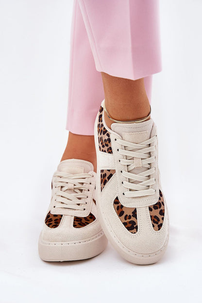 Luxury women's stylish sneakers by Step in style featuring eco leather and fabric with a trendy leopard print design, worn with pink trousers.