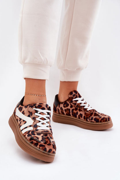 Luxurious women's platform sneakers in leopard print, designed by Step in Style, featuring a comfortable foam insole, suitable for stylish everyday wear.