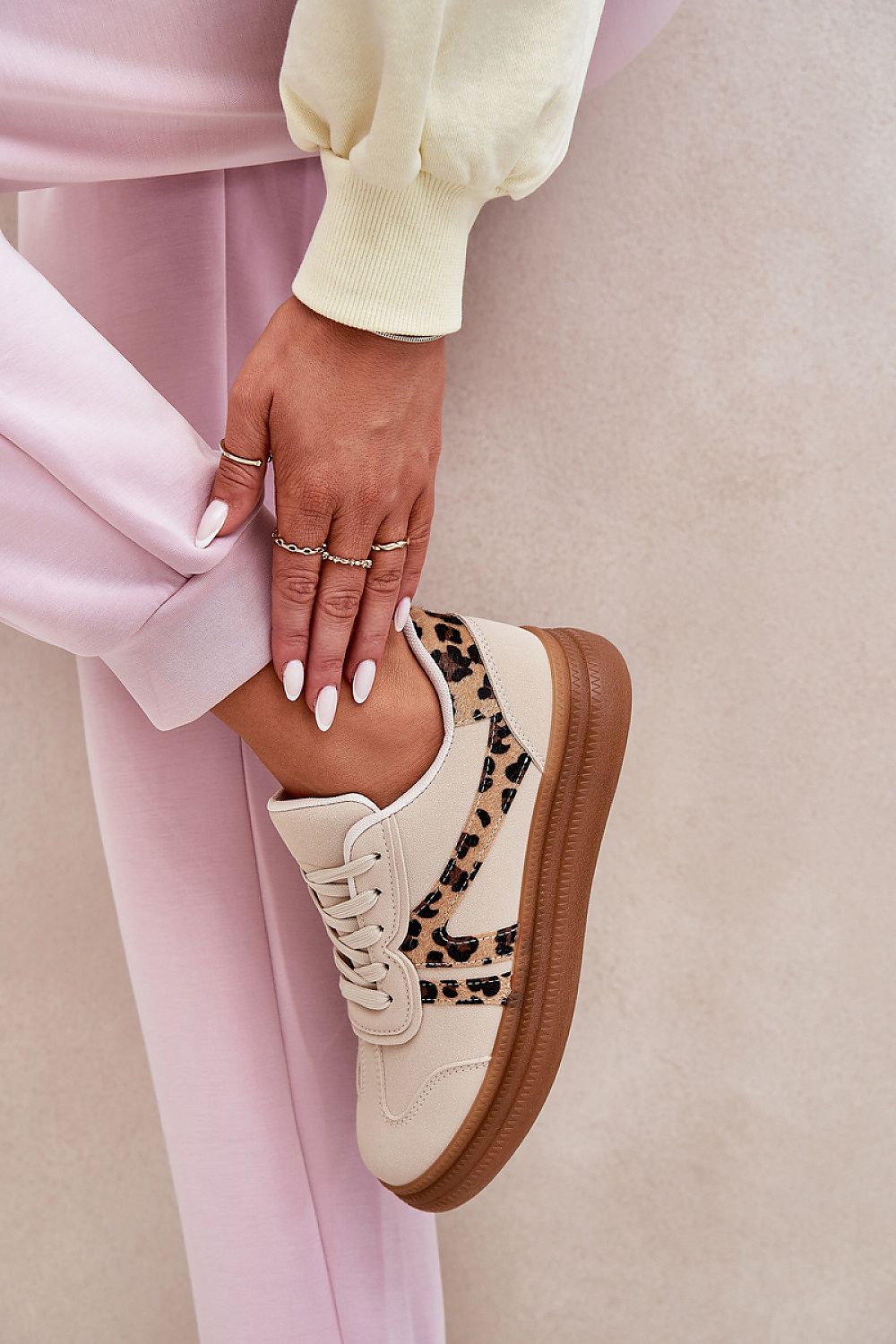 Elegant women's platform sneakers with a stylish leopard print accent, showcasing a beige design perfect for versatile everyday fashion by Step in Style.