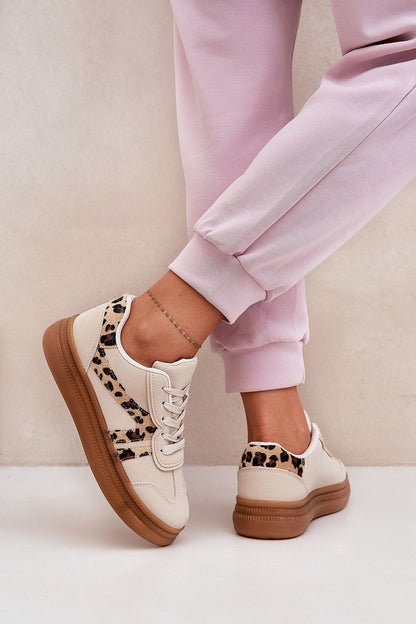 Fashionable women's platform sneakers featuring a bold leopard print on a beige background, ideal for modern style enthusiasts, created by Step in Style.