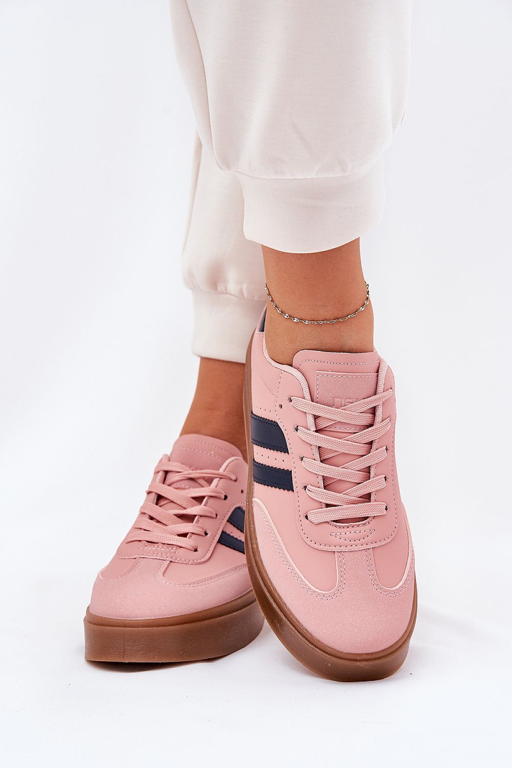 Elegantly styled women's eco leather platform sneakers in soft pink, featuring a rounded toe design and contrasting navy stripes, perfect for all-day comfort and chic everyday wear by Step in Style.