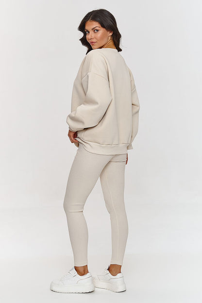 Chic fitted leggings crafted from soft cotton-spandex blend by Makadamia, ideal for a versatile and fashionable sweatsuit ensemble.