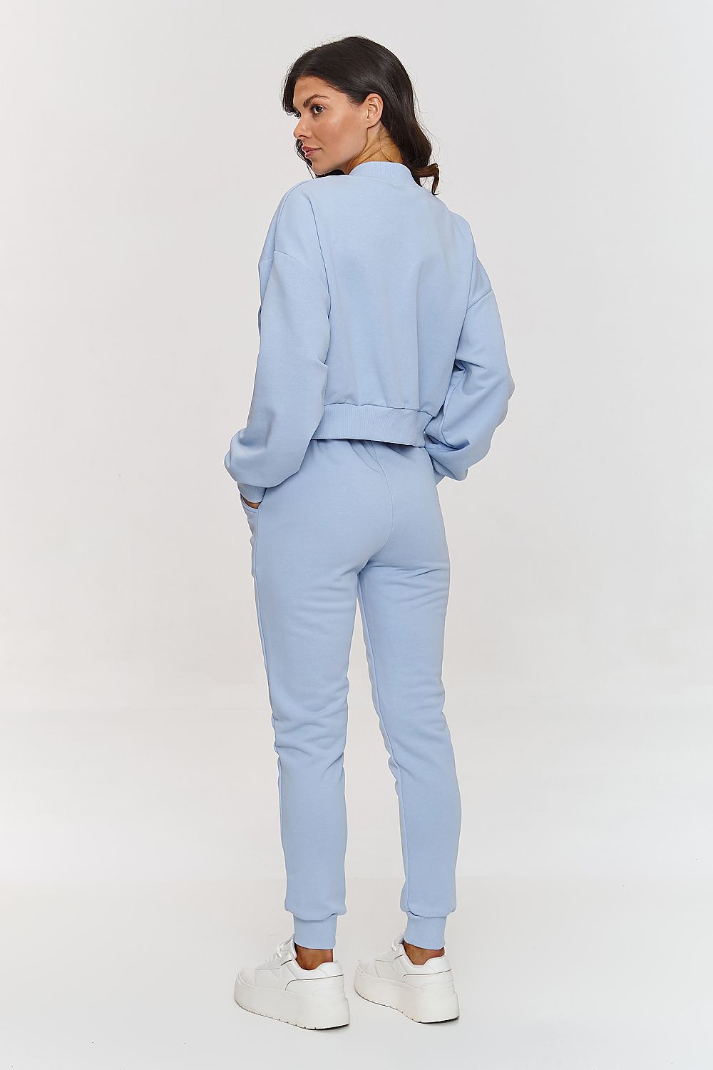 Stylish Makadamia 3-in-1 cotton tracksuit set showcasing a modern bomber jacket, contemporary striped top, and effortlessly chic loose-fit pants for the fashionable individual.