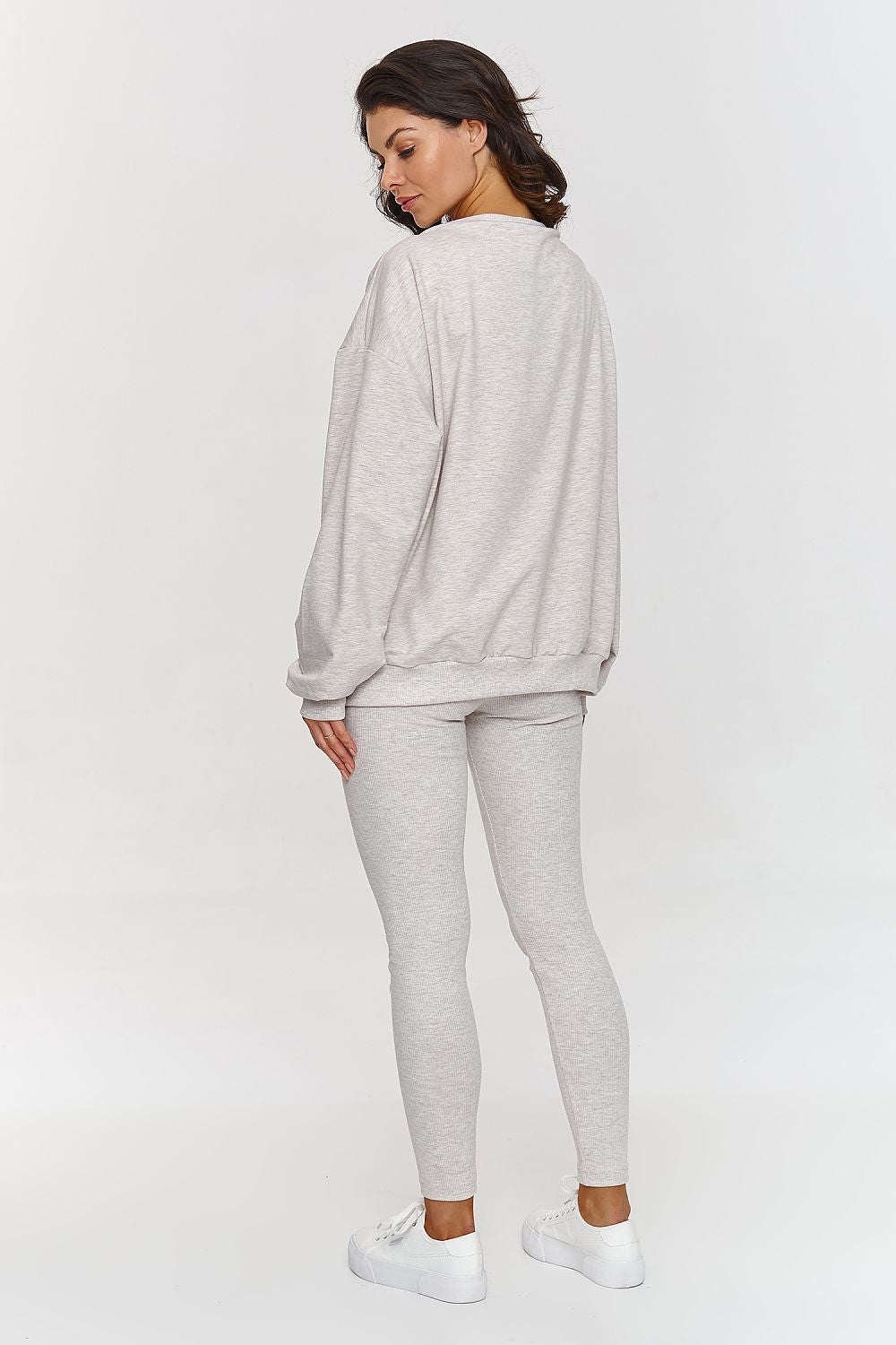 Luxury Makadamia Women's Tracksuit Set featuring an oversized sweatshirt and fitted ribbed leggings, crafted for elegance and comfort, suitable for sizes EU 0-44.