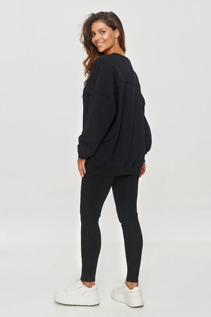 Stylish high-waisted leggings in soft ribbed fabric by Makadamia, ideal for casual outfits with oversized blouses or fitted tops