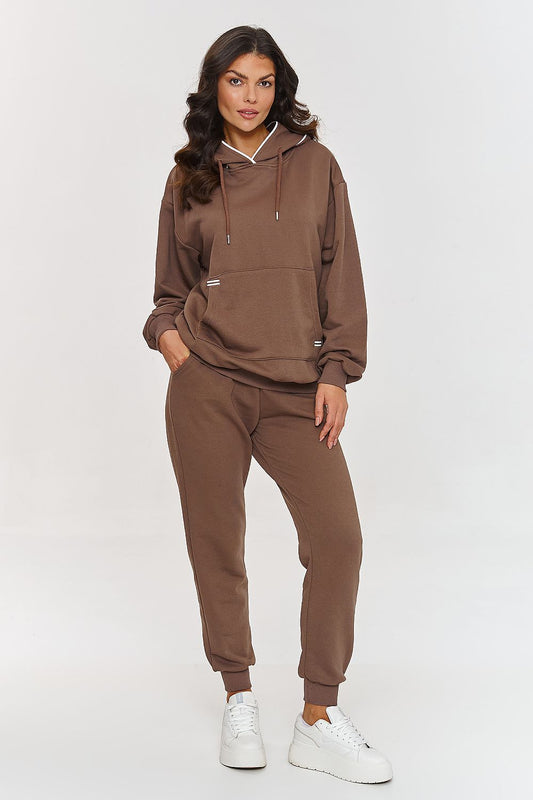 Elegant minimalist hoodie and pants set from Makadamia, featuring unique embroidered details for a luxurious touch.