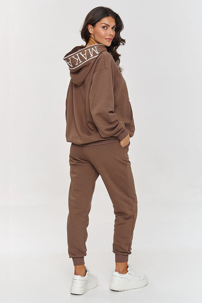 Close-up view of the embroidered details on the Makadamia minimalist hoodie, showcasing luxury and refinement.