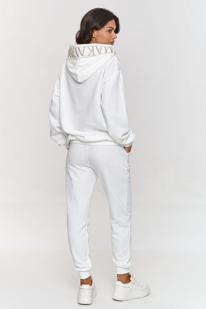 Luxurious and elegant Makadamia minimalist hoodie and pants set in size EU 0, showcasing exquisite embroidered details and a stylish white trim for a modern look.