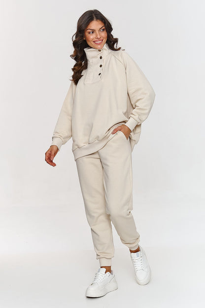 Stylish cotton blend blouse and sweatpants set by Makadamia, elegantly displaying a relaxed fit with metal button accents, perfect for casual luxury.