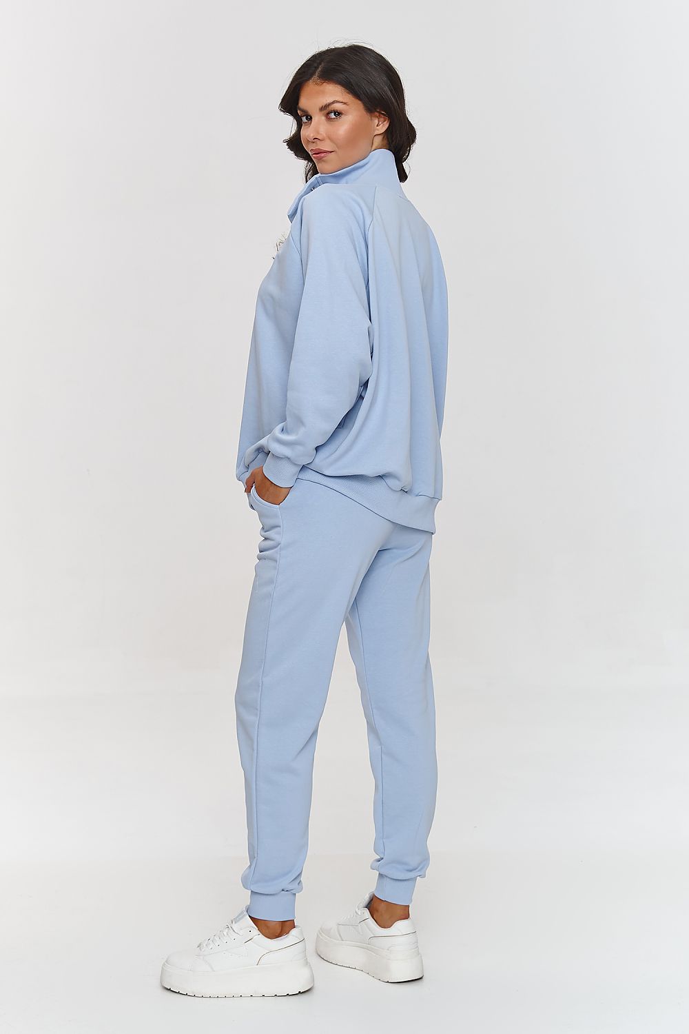 Stylish blouse with stand-up collar and metal buttons by Makadamia, designed for layering and timeless appeal.