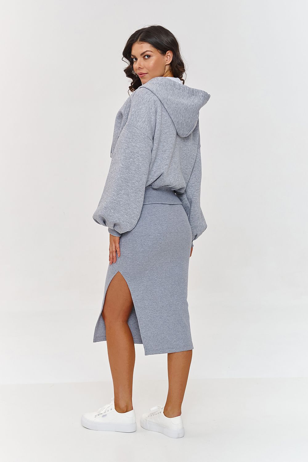 Elegant women's striped dress featuring a flattering silhouette, designed by Makadamia, perfect for summer styling.