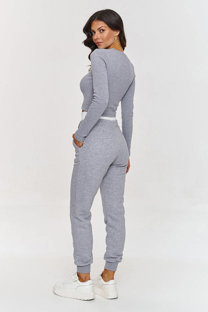 Comfy sweatpants from Makadamia, featuring an elastic waistband and minimalist design, ideal for a relaxed luxury look in cotton set size 36-38.