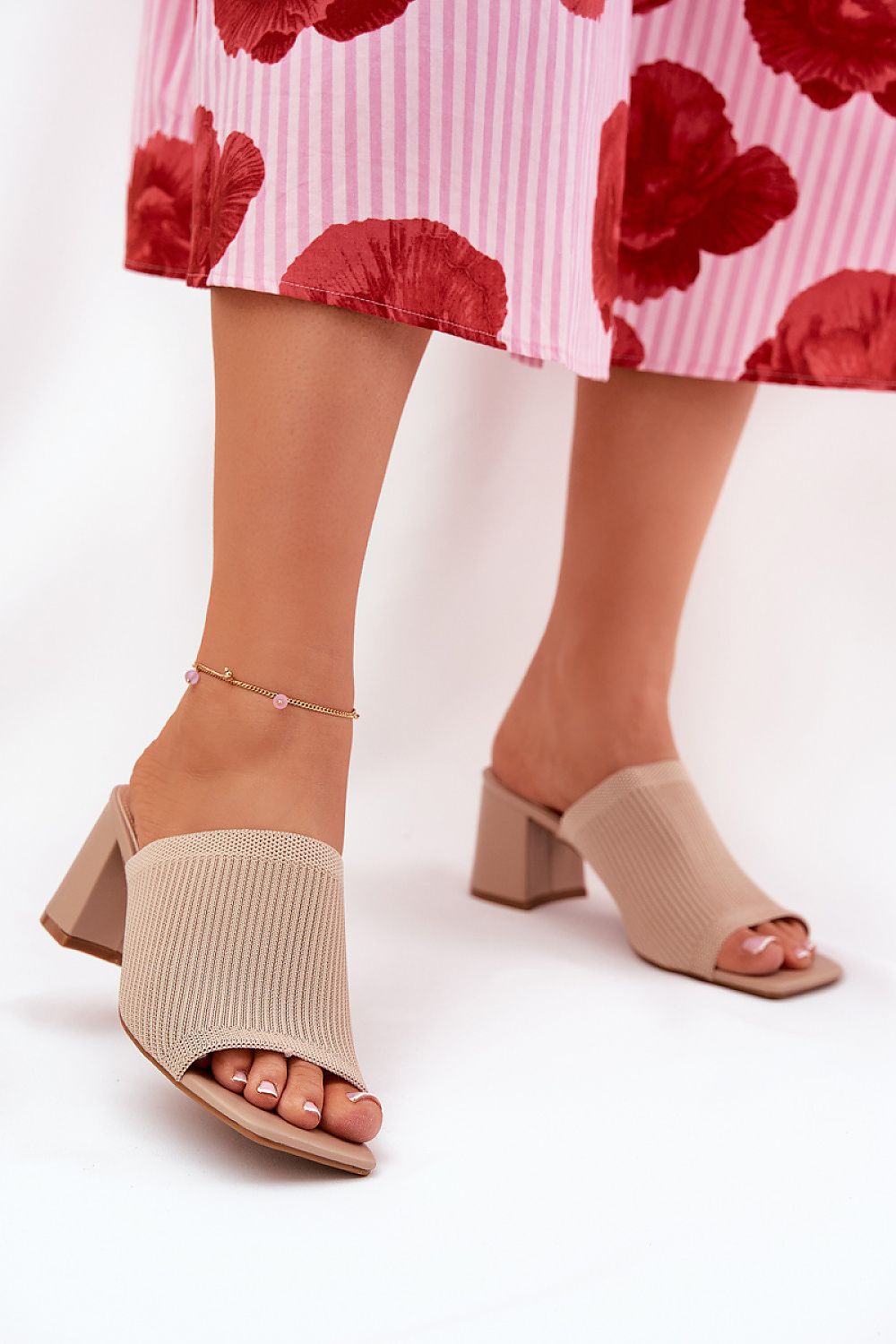 Elegant woman's textile sandals by Step in Style, featuring a 6.5cm heel and stylish open toe design, perfectly paired with a floral summer dress.