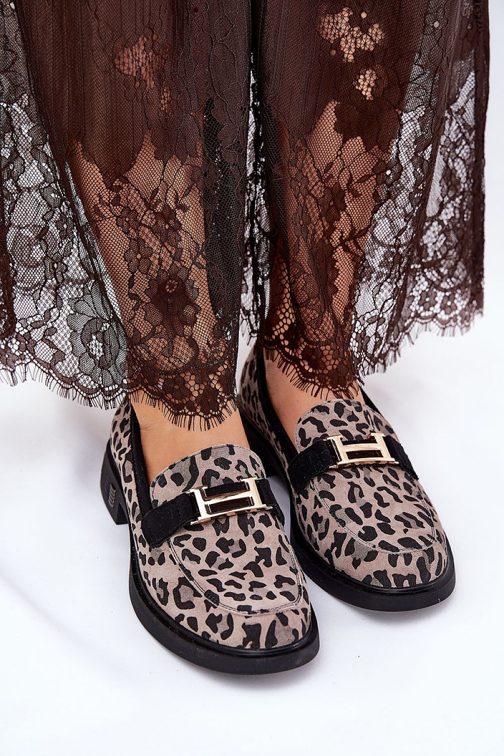 Vinceza Women's leopard pattern eco suede moccasins displayed in elegant style, showcasing their comfortable flat design and trendy appeal for sophisticated footwear fashion.