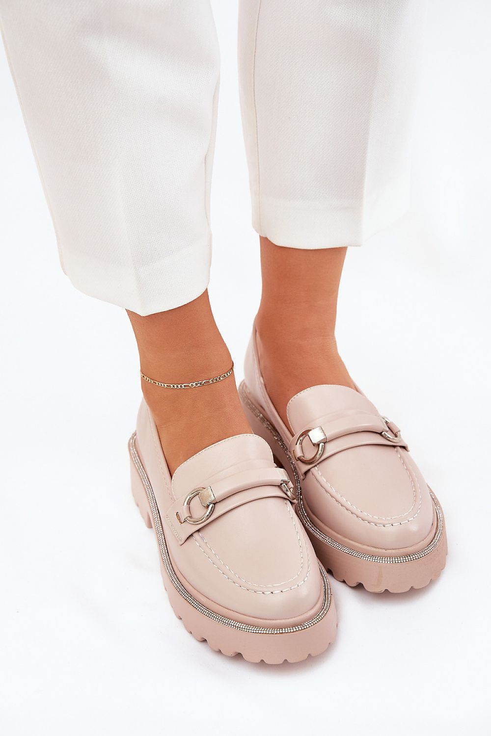 Step in Style luxury moccasins in various sizes EU 36-41, crafted from eco leather with a fashionable decorative strap, perfect for upscale daily wear.