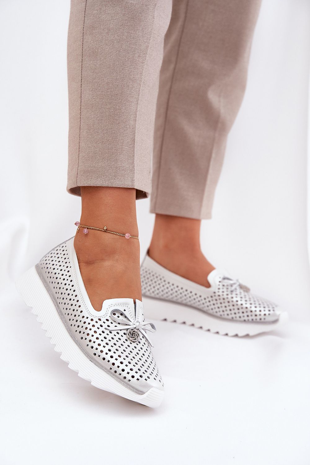 Step in Style elegant natural leather oxford shoes with a charming bow and lacy upper, ideal for adding sophistication to everyday outfits.