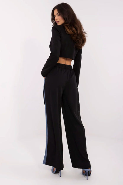 Luxury Women's High Waist Trousers NM showcasing a stylish design with wide legs and practical side pockets, perfect for casual wear.