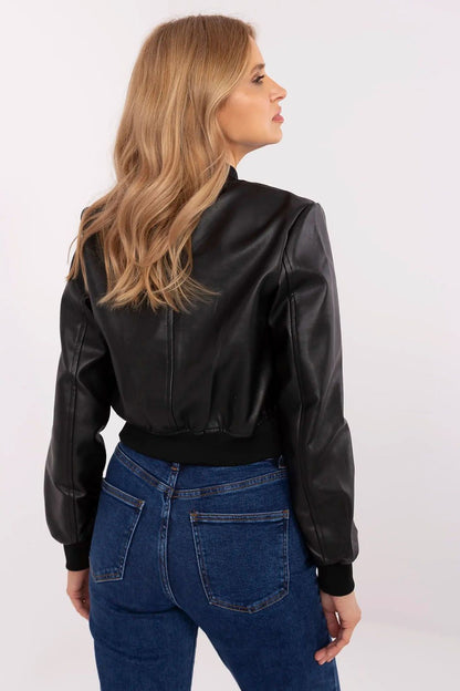 Luxury NM women's eco leather bomber jacket featuring a stylish design, modern snaps, and practical front pockets, available in sizes S to L, perfect for transitional seasons.