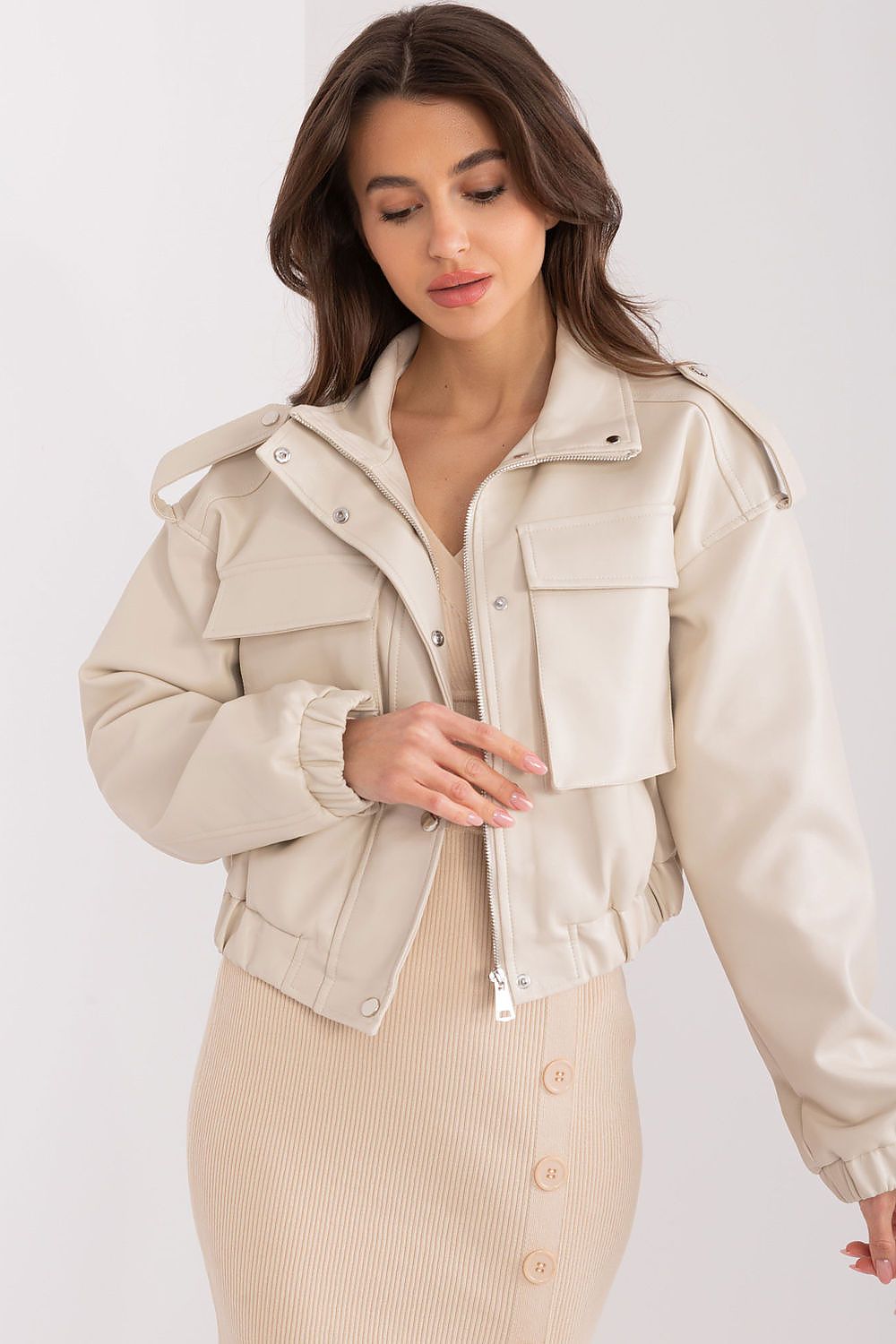 Luxury Women's eco-leather transitional jacket from NM, showcasing an elegant design with pockets and a stylish lining, perfect for versatile styling.