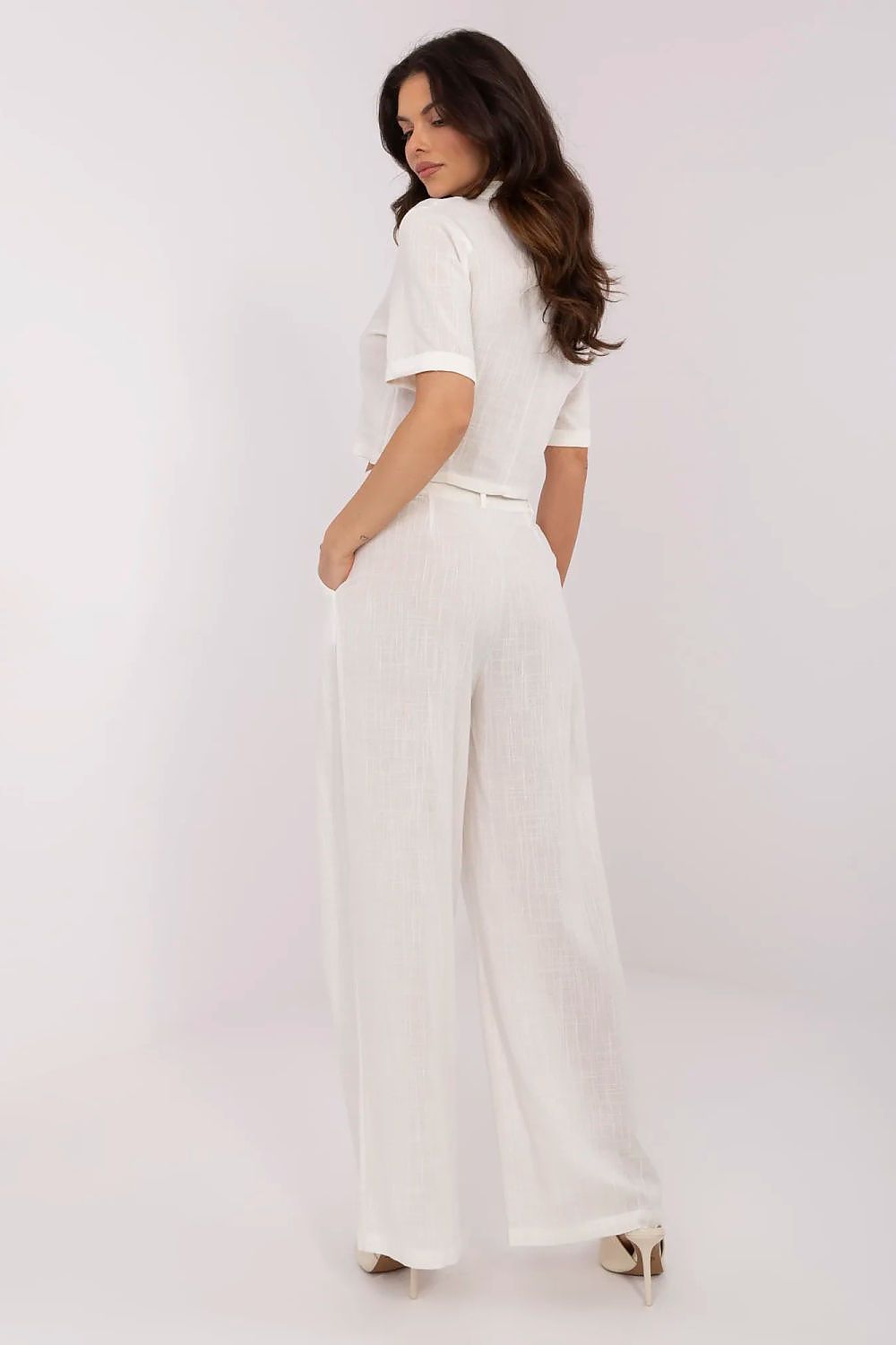 Sophisticated wide-leg pants of the Linen Viscose Ladies' Casual Set, highlighting a flattering high waist and functional inset pockets by NM.