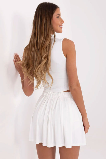 High-quality polyamide and elastane tennis set for women by NM, featuring a sophisticated design for superior movement and breathability.