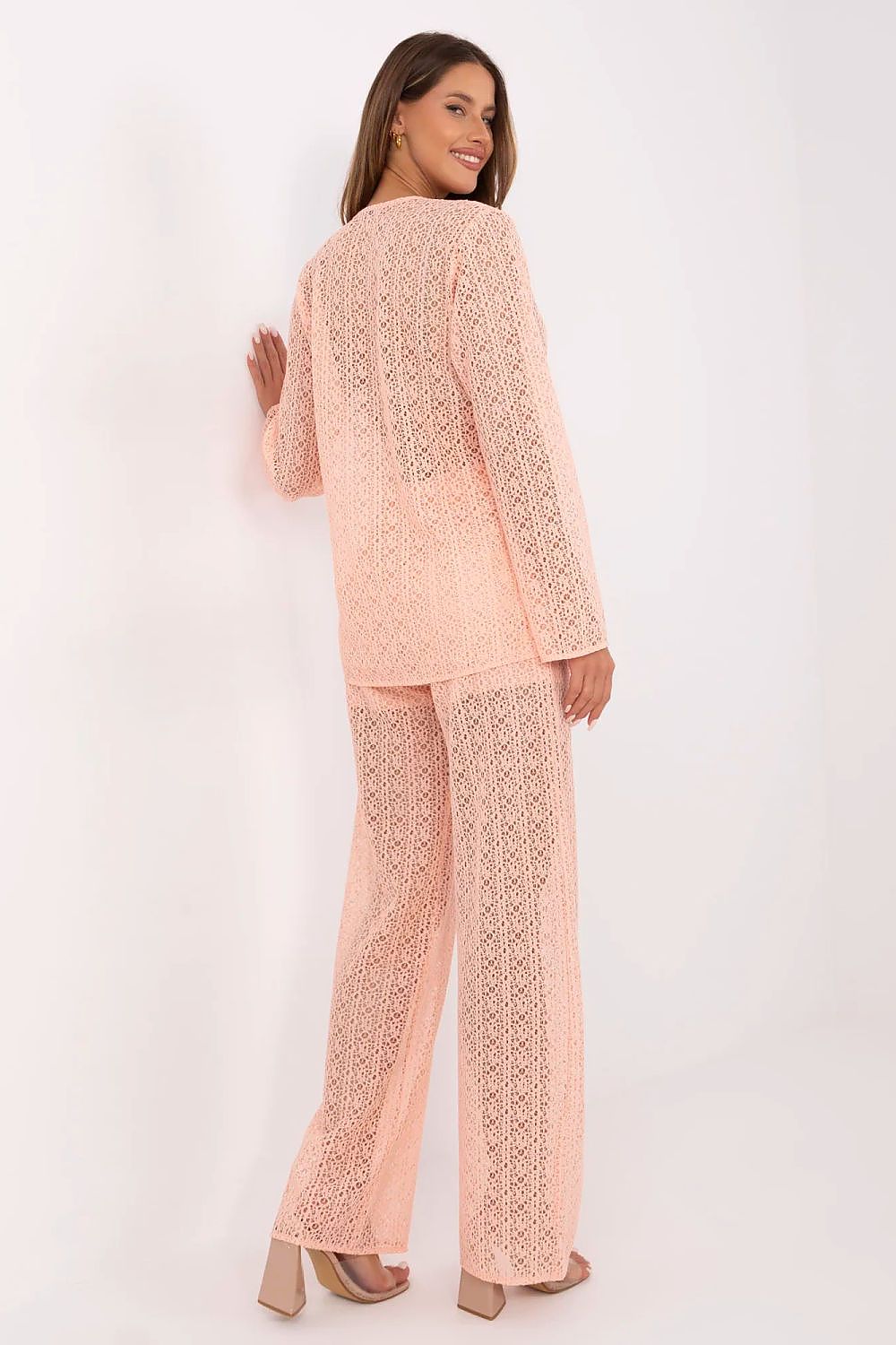 Model wearing the Lakerta elegant openwork set, highlighting the chic silhouette and comfortable fit, ideal for modern women.