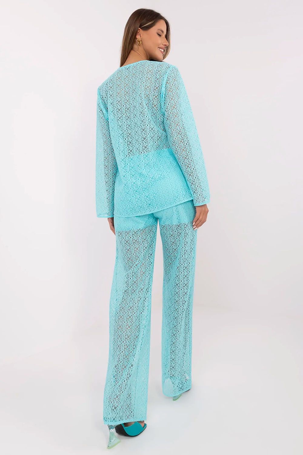 Close-up of the stylish Lakerta women's shirt with long sleeves and front tie detail, showcasing its lightweight elegance and openwork pattern.