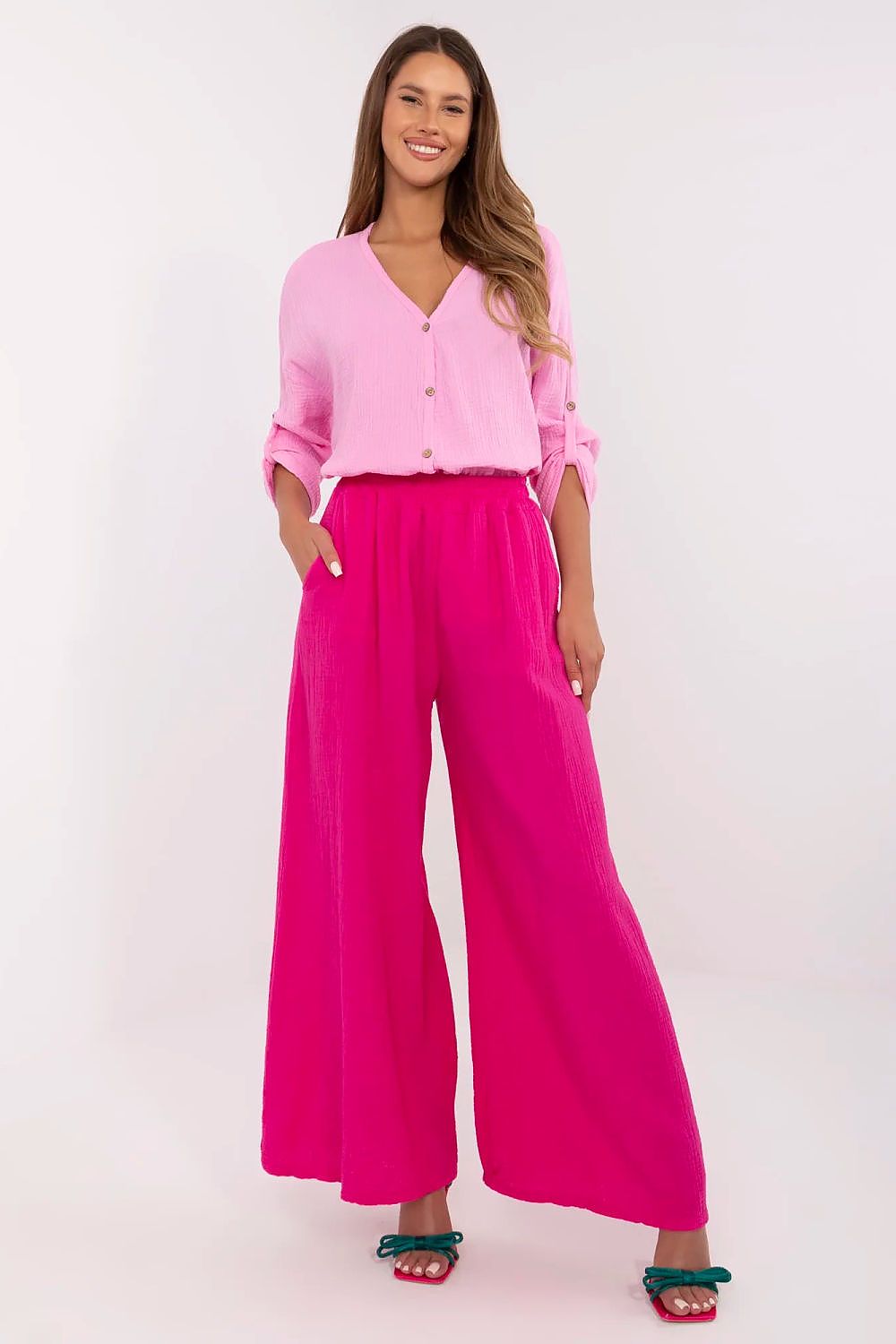 Elegant muslin palazzo trousers for women by Italy Moda, featuring a breathable cotton fabric, ideal for warm weather wear.
